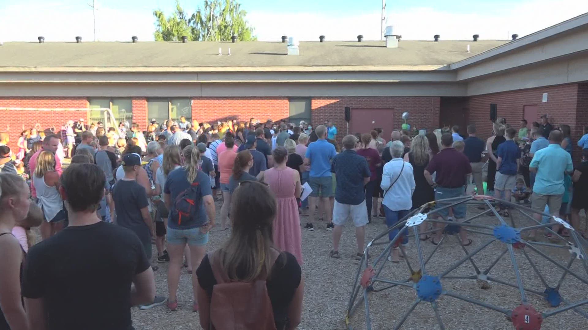 The community gathered Monday evening to remember and mourn Iain Rowe, who drowned in Lake Michigan over the weekend.