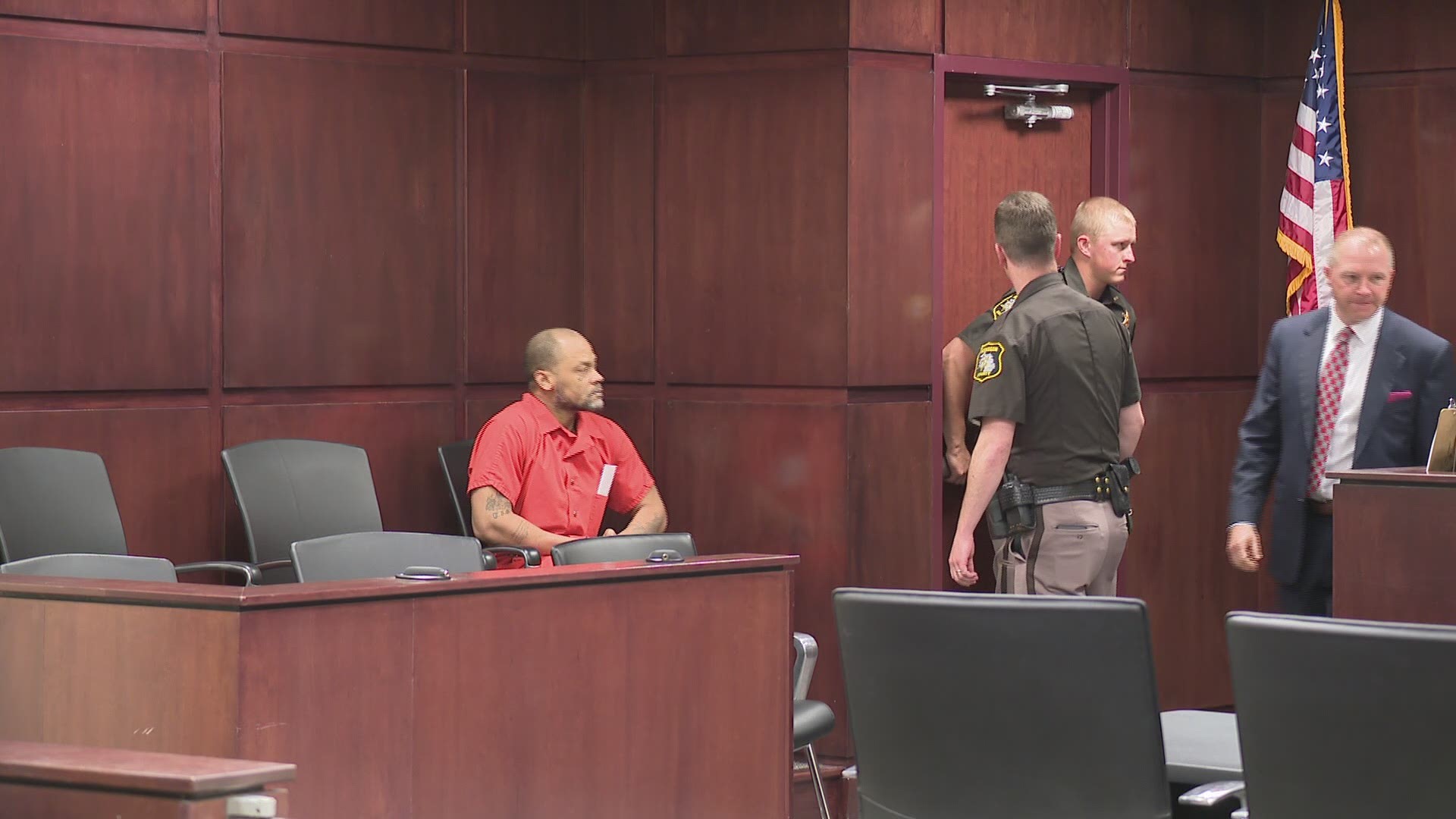 While Vashon Flowers was seated waiting for the preliminary examination to begin, a man identified by family members as the son of Jamie Thomas-Flowers, darted from his seat and attempted to reach Flowers.