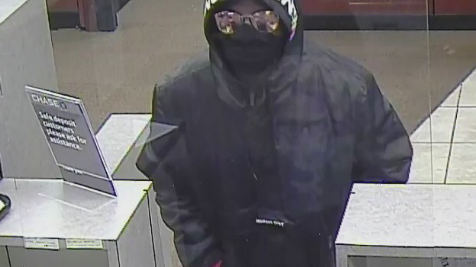 Police released surveillance photos of a suspect that held up a bank on the city's southeast side.