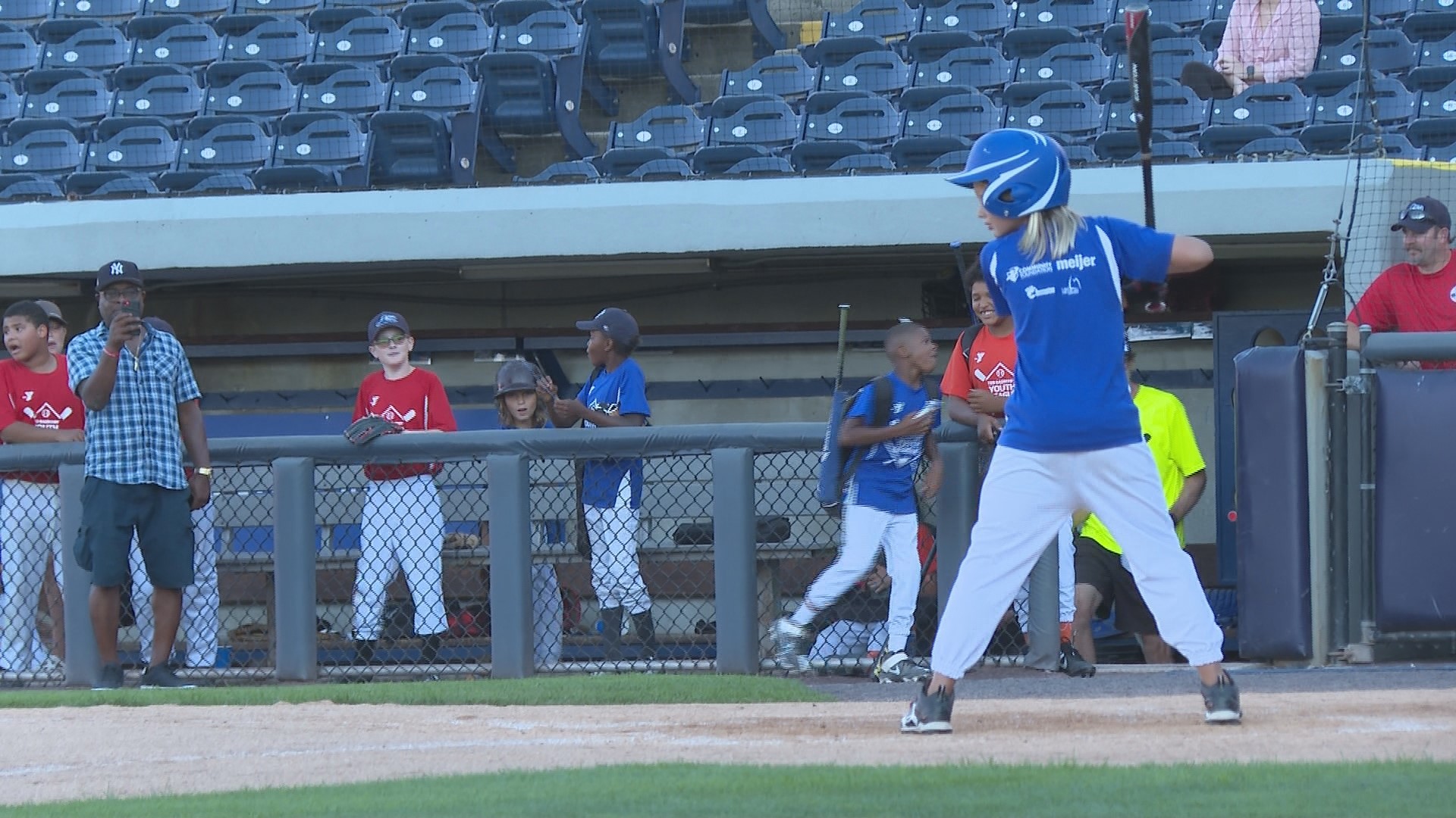 It was a night that many young baseball and softball players won't ever forget, as LMCU Ballpark became their field of dreams on Thursday evening.
