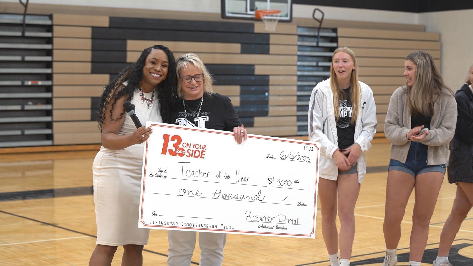 Bethanie duChemin, retiring after 31 years, wins Teacher of the Year at Newaygo High School with surprise assembly and $1,000 prize.