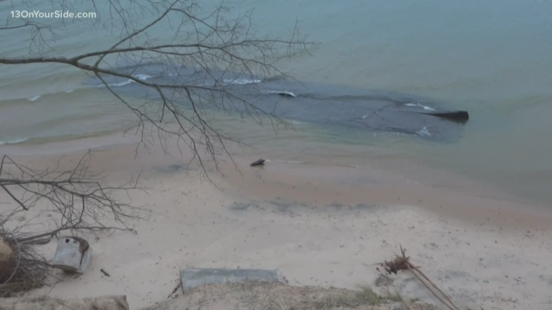 The scow is believed to be one that sank while being towed by a tug and transporting a steam crane between Muskegon and Grand Haven.