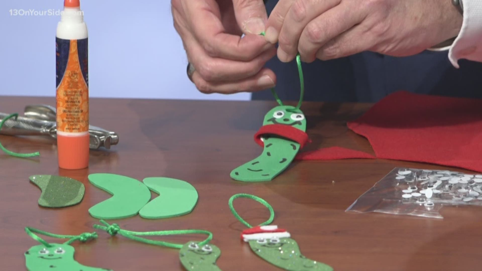 See how to create a Christmas pickle to hang on your tree.