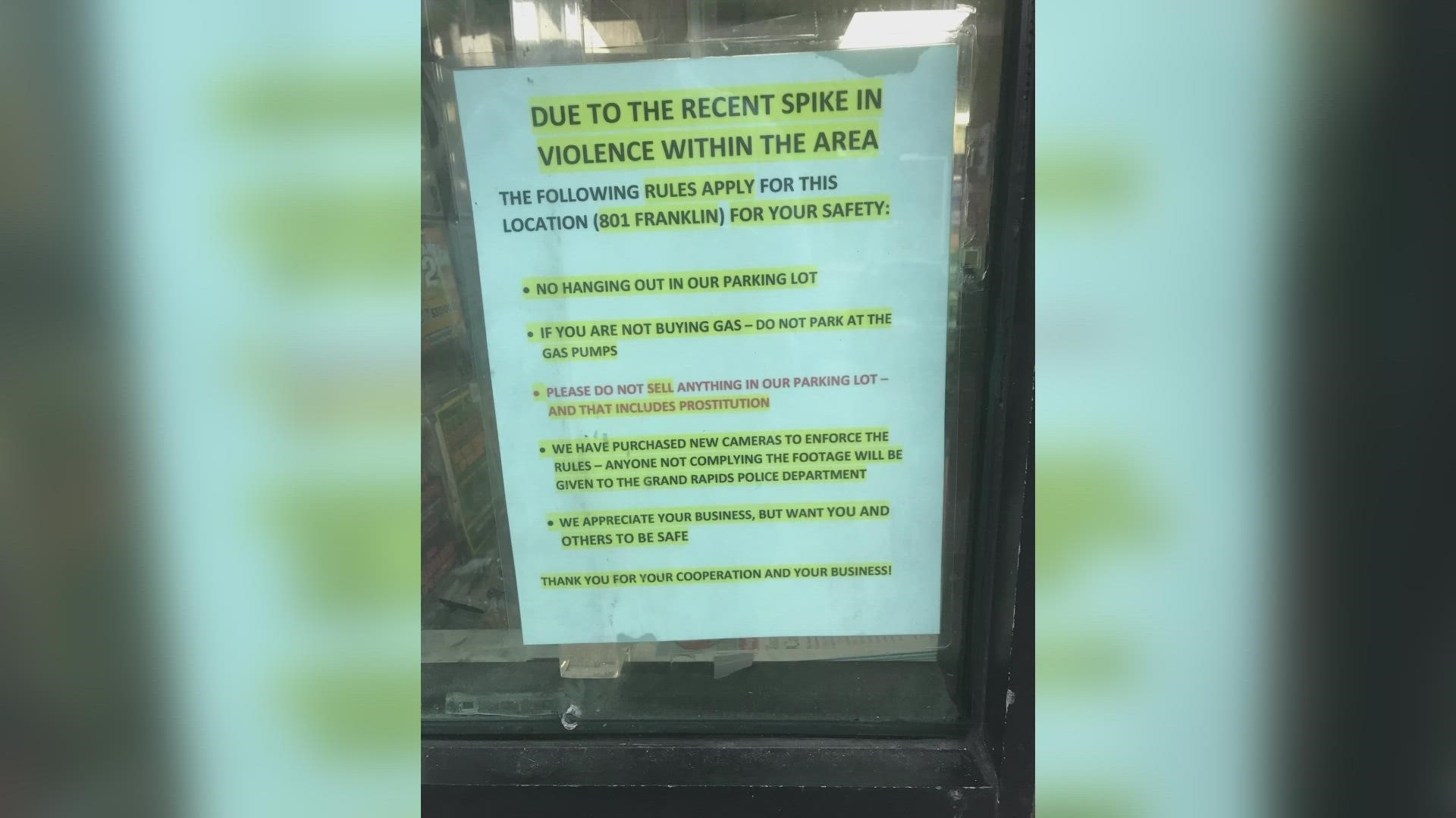 A sign was put on the front door of a gas station in Grand Rapids in an effort to reduce 'a recent spike in violence' in the area.