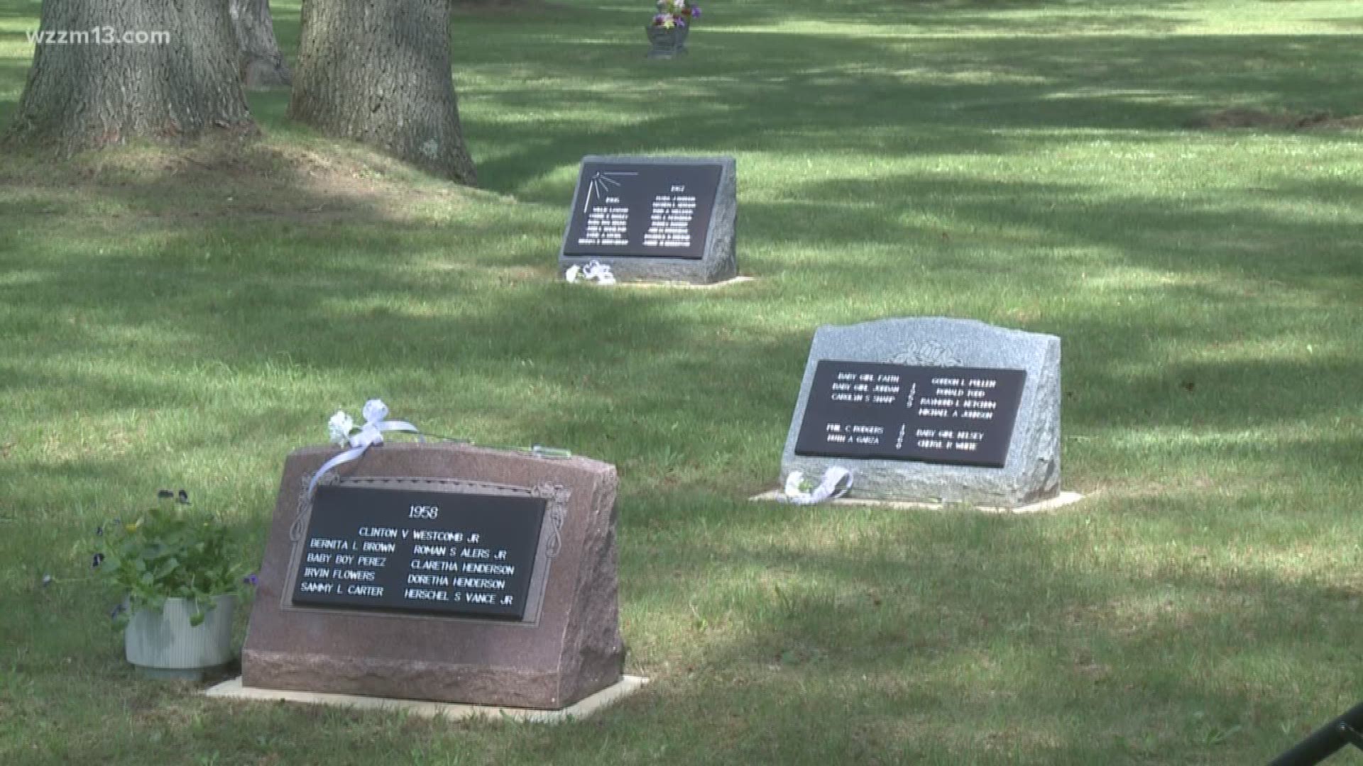 Headstones placed on unmarked graves for 72 children in Muskegon