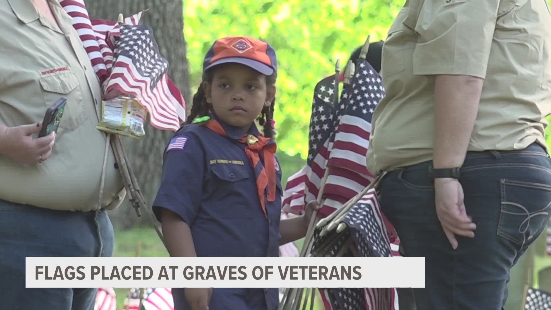 Dozens of people showed up at the cemetery next to the Michigan Veteran Homes to help out.