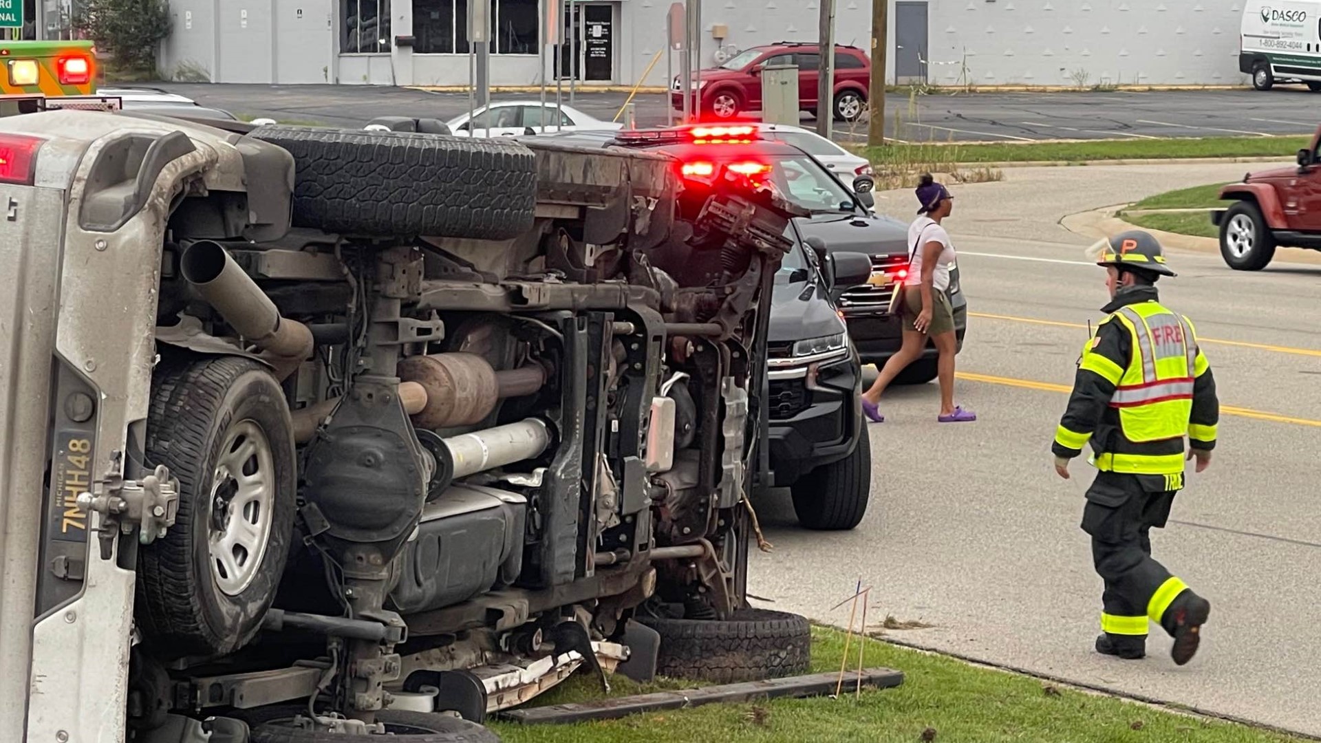 Power lines hang after rollover crash in Walker