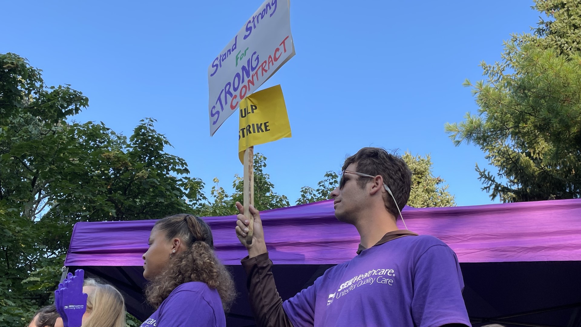 Dozens of workers began the strike Friday morning outside the hospital, where they are calling for higher wages and better working conditions.