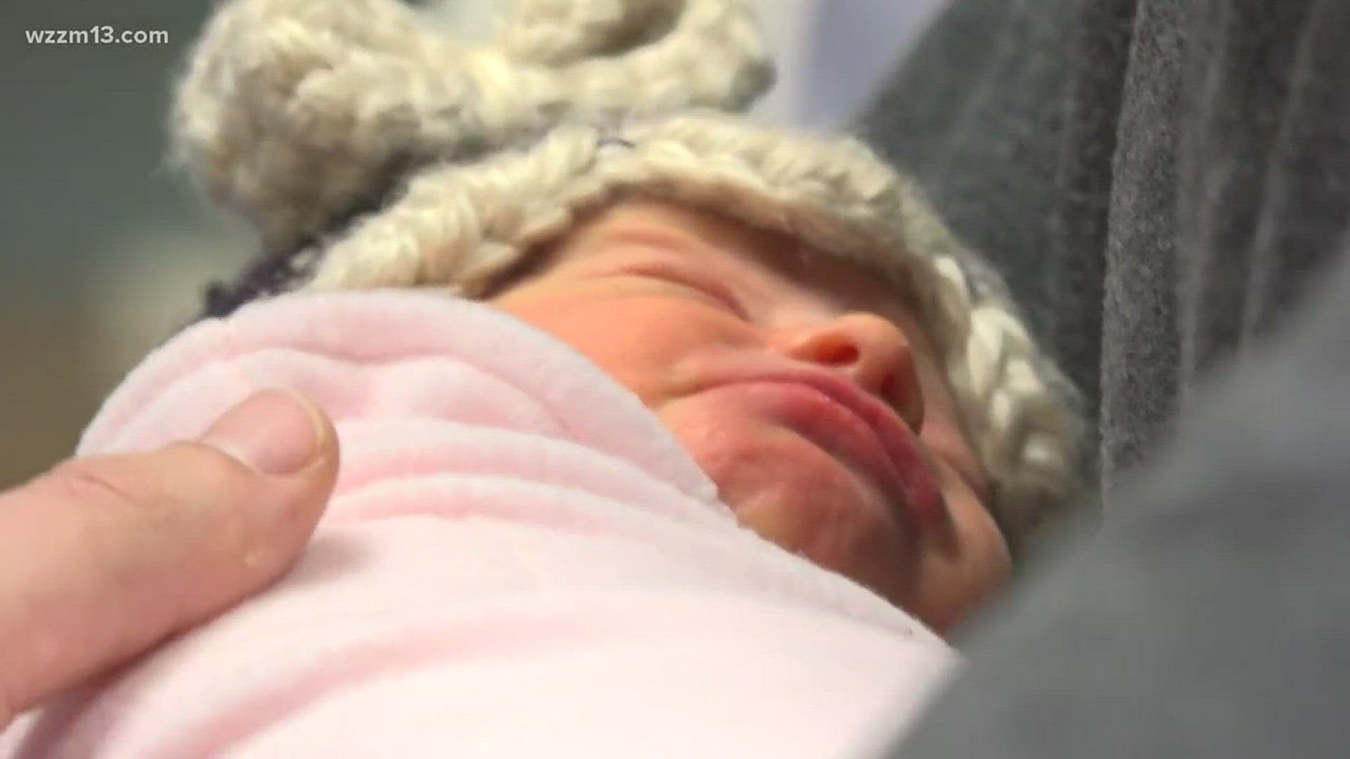 Delivery room surprise for Grand Haven couple