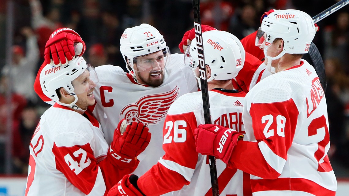 Larkin's first career hat trick powers Red Wings past Devils | wzzm13.com
