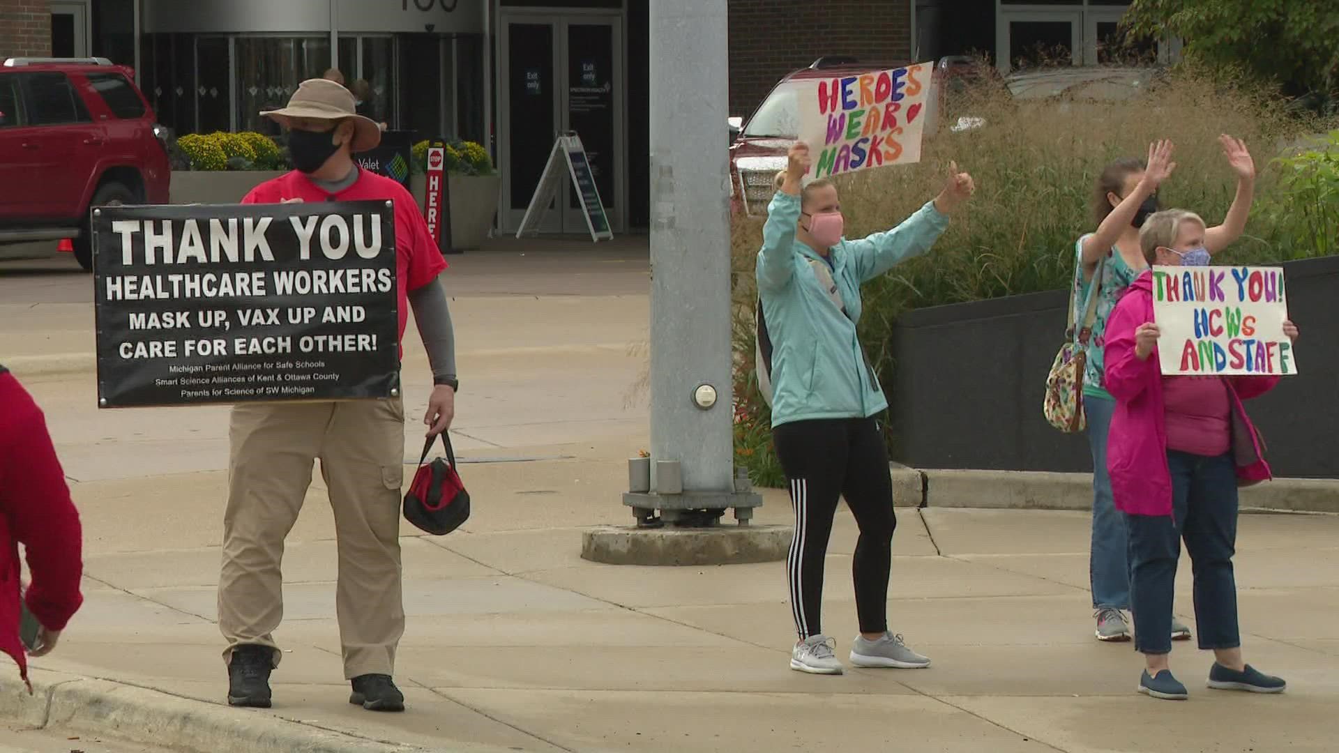 Michigan parents rallied for health care workers along the Medical Mile in Grand Rapids. They're also calling for universal masking in all schools.