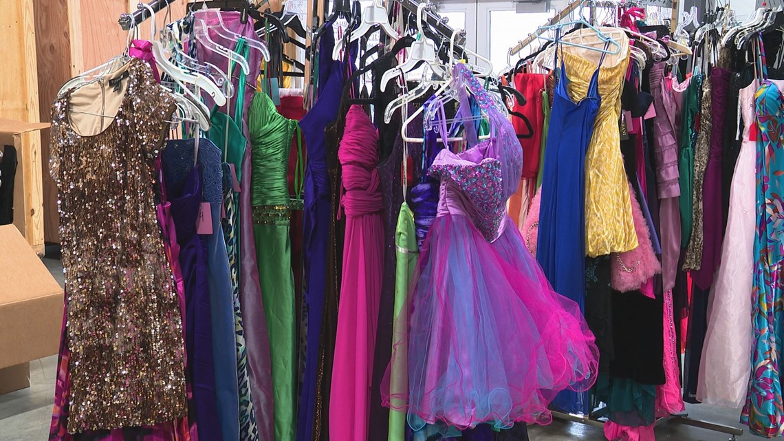 Two Men and a Truck helping to give away gently used prom dresses